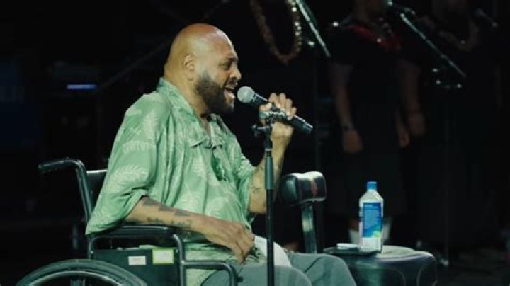 Why Is Singer Fiji In A Wheelchair? George Veikoso Illness &amp; Health Condition